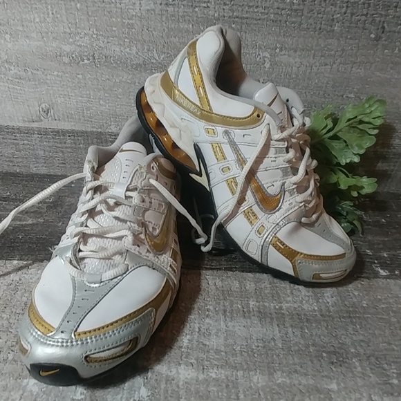 Nike Shoes - Nike ReAX gold & white running shoe size 8